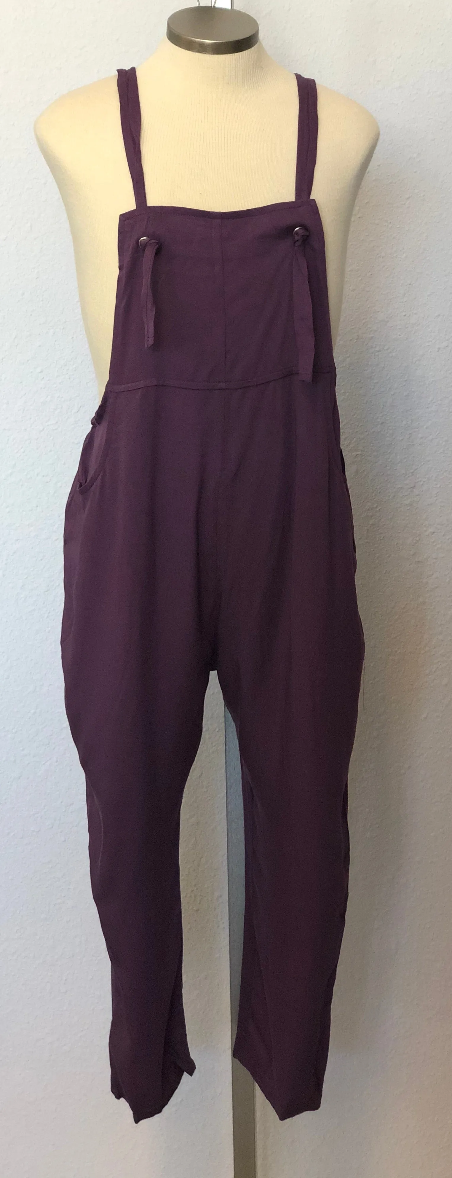 K STRAP JUMPSUIT